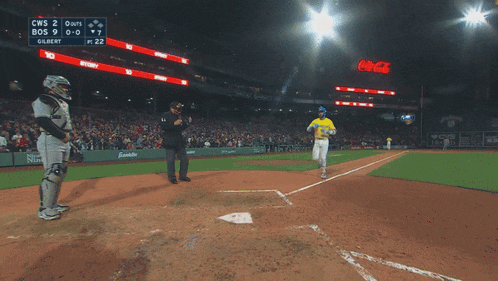 a baseball game is being played and the score is 7-7