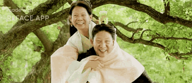 a man is carrying a woman on his back in front of a tree made with reface app