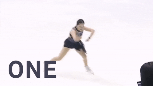 a woman ice skating with the words slay one must above her