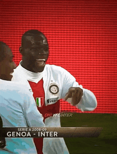 two soccer players on a field with the words serie a 2008-09 genoa - inter on the bottom