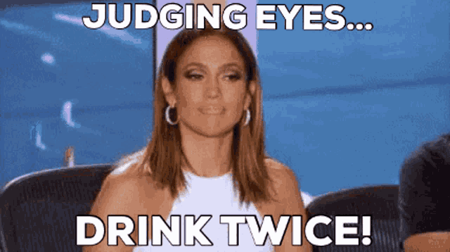 a woman is sitting in a chair with the words judging eyes drink twice