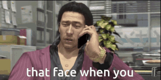 a man talking on a cell phone with the words that face when you on the bottom