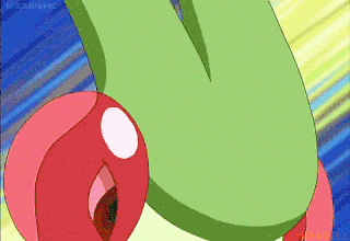 a green and pink cartoon character with the letter u on its head