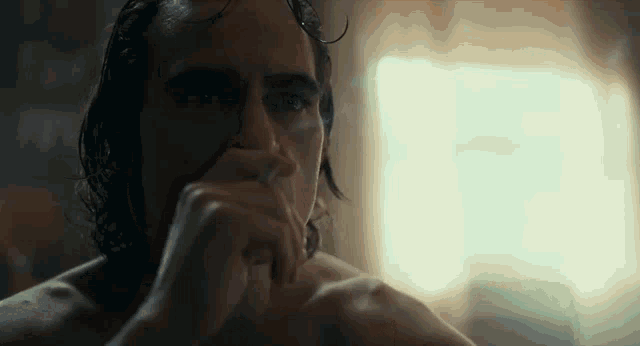 Joker Joaquin Phoenix GIF - Joker Joaquin Phoenix Smoke GIFs