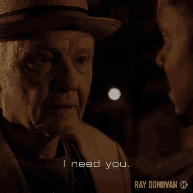 a man in a hat is talking to another man with the words " i need you " above him