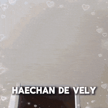 a sign that says haechan de vely with hearts on it