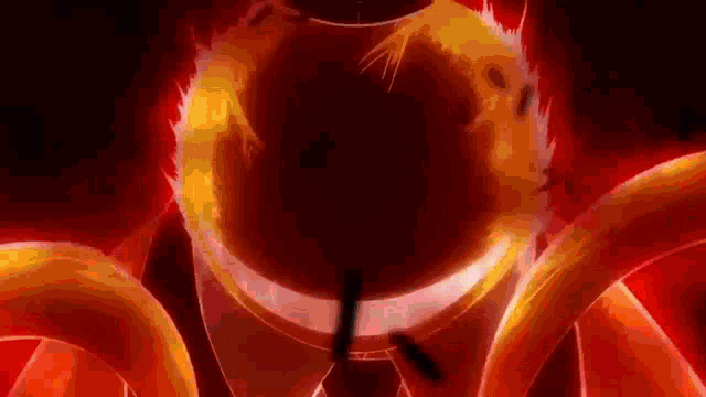 a close up of a person 's face with a red background and a circle of fire around it .