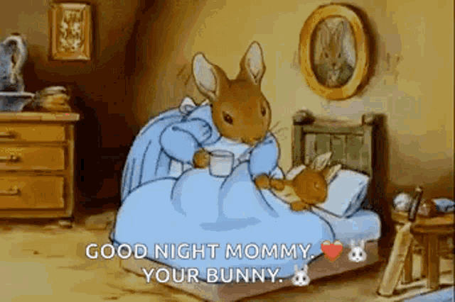 a cartoon rabbit is laying in a bed with a cup of milk and a bunny .