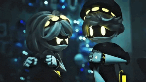 a boy and a girl are standing next to each other with their eyes lit up