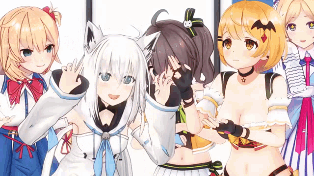 a group of anime girls are posing for a picture together