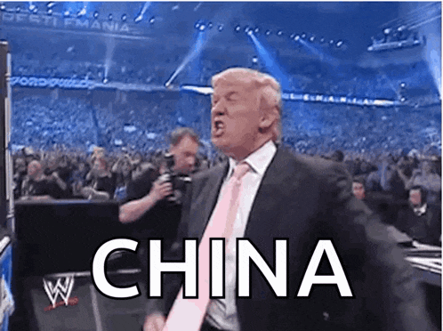 a man in a suit and tie is screaming in front of a crowd and the word china is on the screen