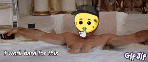 a man is laying in a bathtub with a smiley face on his face and the words i work hard for this