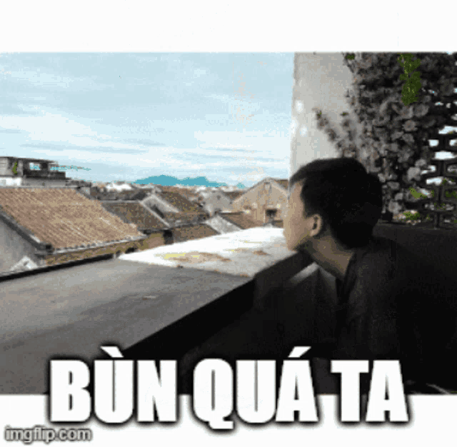 a picture of a boy looking out a window with the words bun qua ta on the bottom