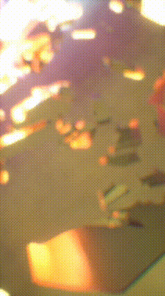 a blurry picture of a person 's face with a purple and yellow background