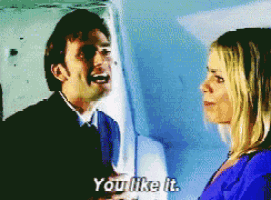 a man and a woman are standing next to each other and the man says you like it