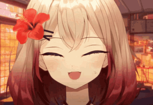 a close up of a girl with a flower on her head
