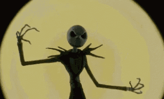 a skeleton from the nightmare before christmas is standing in front of a full moon .