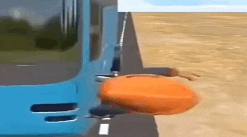 a blue bus is driving down a road with a pumpkin on the side of the road .