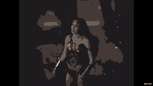 a silhouette of a man holding a shield in front of a large fire