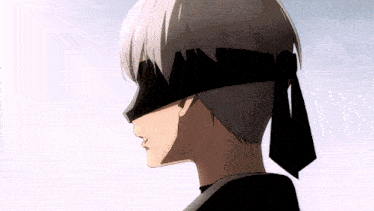 a close up of a person wearing a black blindfold