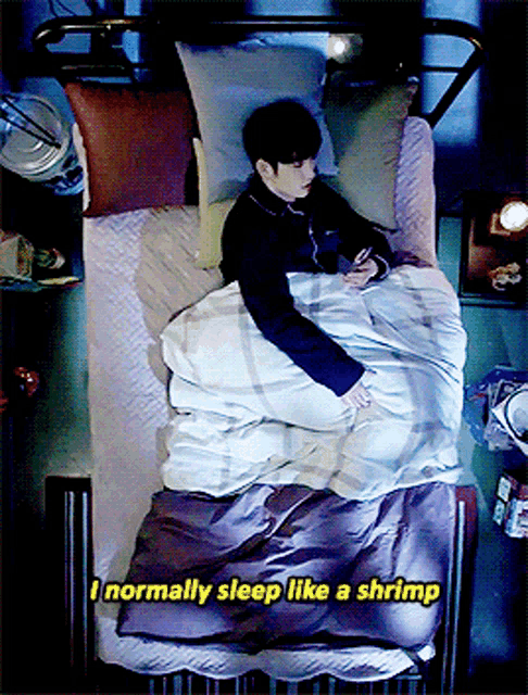 a person laying in bed with the words " i normally sleep like a shrimp " on the bottom