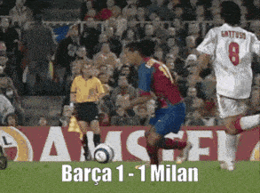 a soccer game between barca and milan is being shown