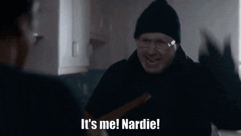 a man in a black hat and glasses says it 's me nardie