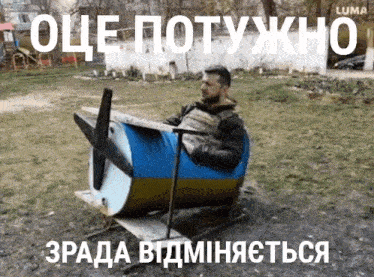 a man is sitting in a chair made out of a barrel with a propeller