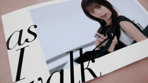 a picture of a woman with the words " as i walk " below it