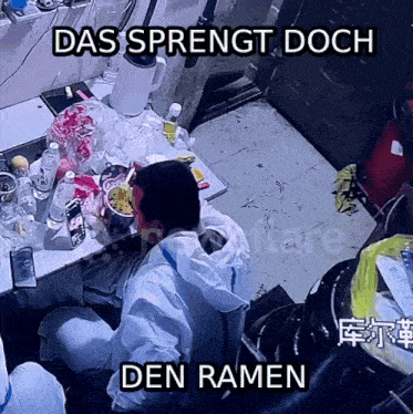 a man in a protective suit sits at a table eating ramen with a caption that says das sprengt doch den ramen