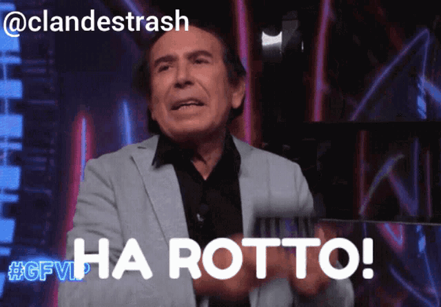 a man in a suit says ha rotto in a foreign language