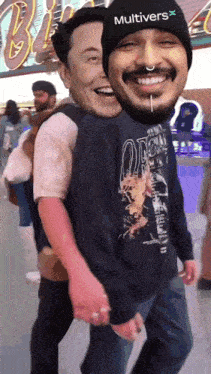 a man wearing a multivers hat is carrying another man on his shoulders