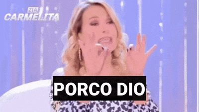 a woman is sitting in front of a sign that says " porco dio "