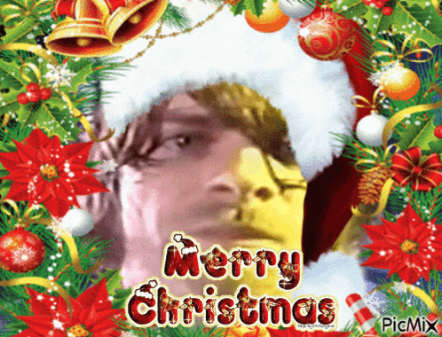 a picture of a man wearing a santa hat with the words merry christmas