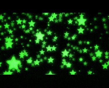 green stars on a black background that are glowing in the dark
