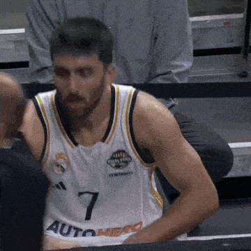 a basketball player wearing a jersey that says auto hero on it