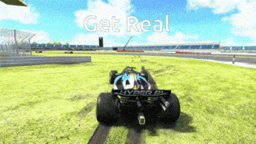 a race car is driving on a track with the words get real behind it