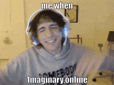 a man wearing headphones and a sweatshirt that says somebody 's imaginary online