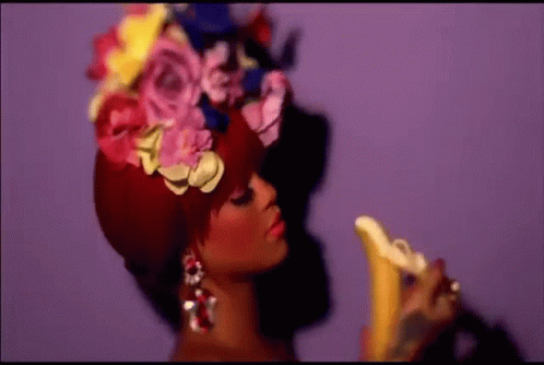 Rihanna Peeling Off Banana GIF - Rihanna Peeling Off Banana Eating Fruit GIFs