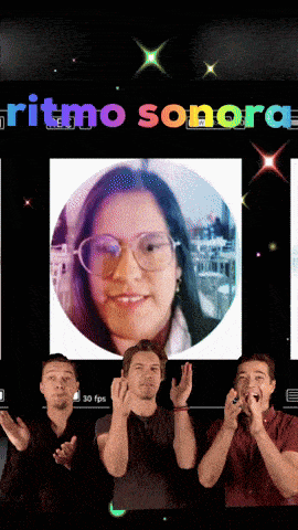 a group of people applauding in front of a screen that says " ritmo sonora "