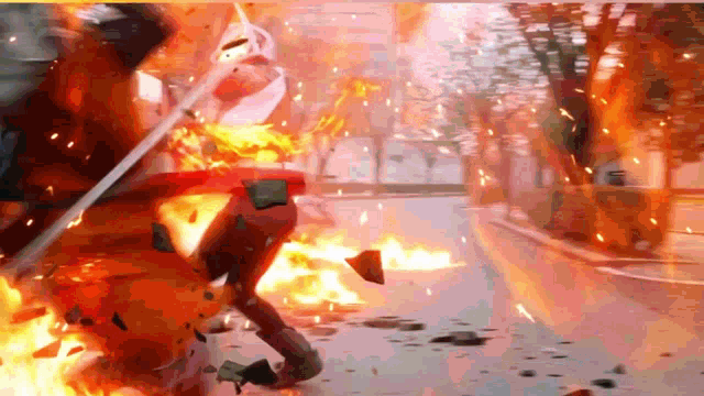 a car is on fire on the side of a street