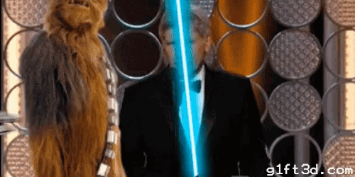 a gif of chewbacca holding a light saber with the website 91ft3d.com in the bottom right corner