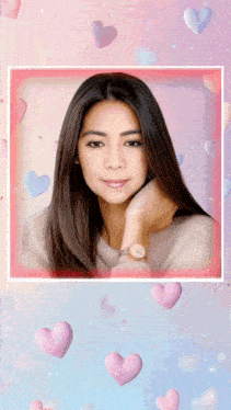 a picture of a woman surrounded by hearts and balloons
