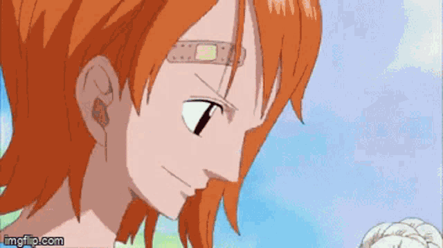 nami from one piece has a bandage on her forehead .