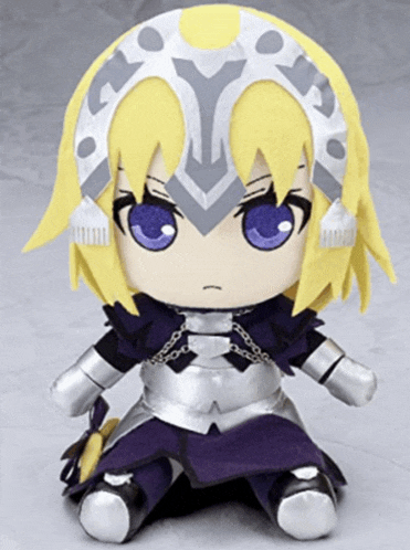 a stuffed toy of a girl with purple eyes and a horseshoe on her head