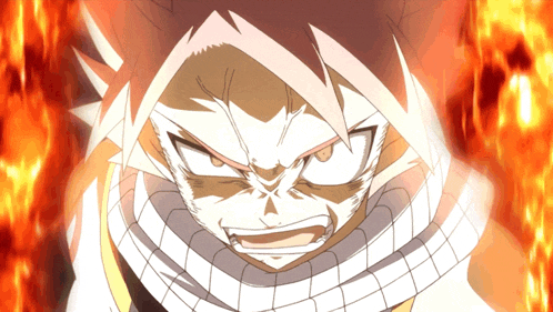 a cartoon character with a scarf around his neck is surrounded by fire