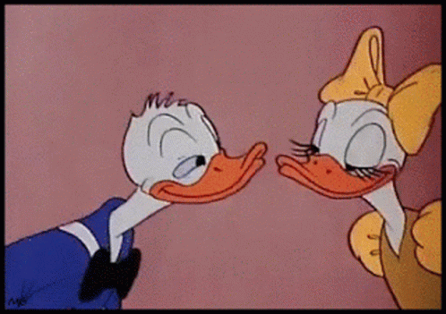 Donald Duck Rub Faces GIF - Donald Duck Rub Faces Rub Beaks GIFs