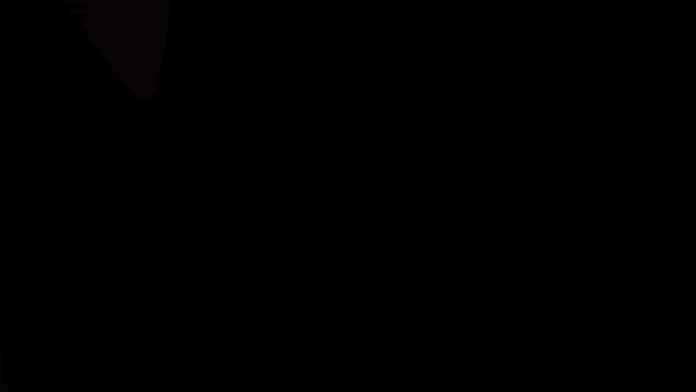 a blurred image of a door with a light on it
