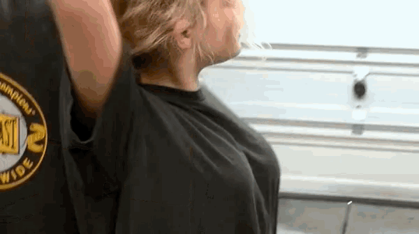 a woman in a black shirt with the number 2 on it