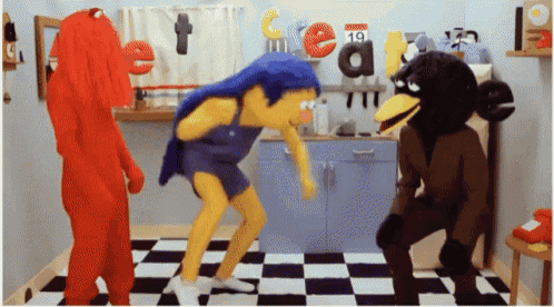 a group of cartoon characters are dancing in a kitchen with a calendar that says 19 on it